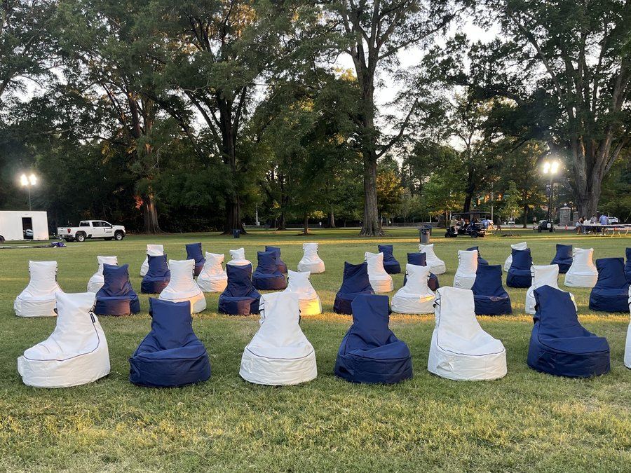 Rows of navy and white Bean Bag Rental Co bean bag chairs set up on the lawn at Duke University for New Student Orientation